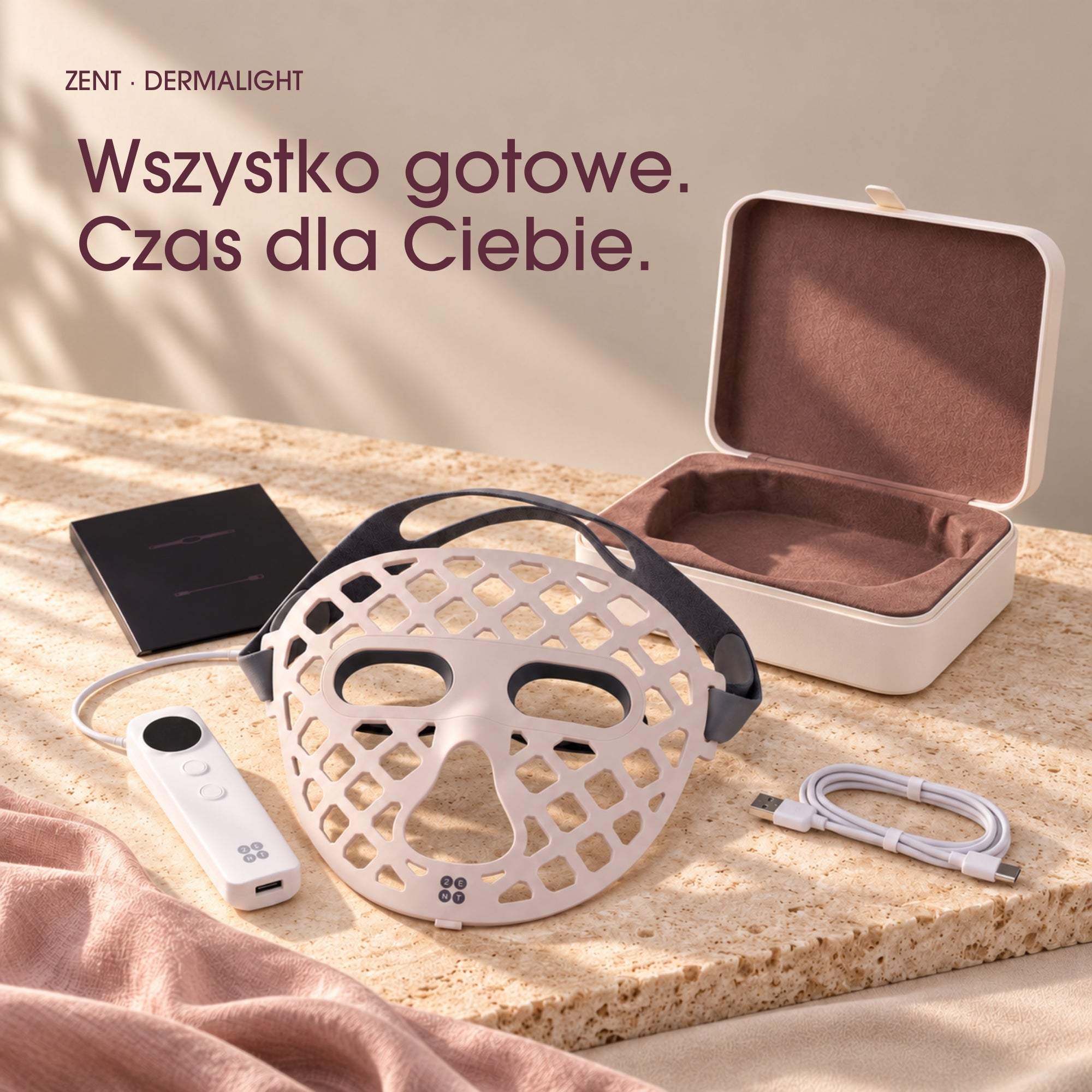 Zestaw DermaLight z maską, kontrolerem, etui, instrukcją i starannie ułożonym kablem USB-C.